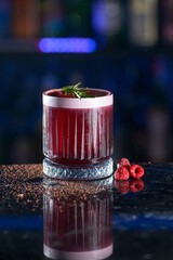 Red drink with ice and raspberrie juice