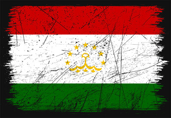 Creative grunge flag of Tajikistan country. Happy independence day of Tajikistan. Brush flag on shiny black background