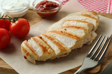Concept of tasty eating with grilled chicken, close up