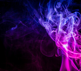 Colored smoke on black background
