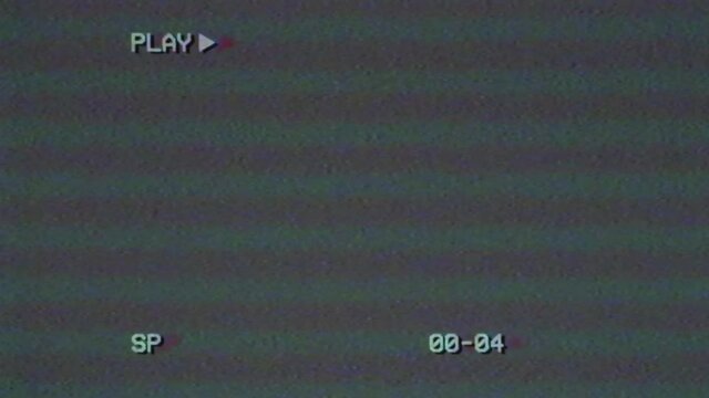 VHS effect. Video Damage. An old bad VHS tape playing. Old screen with PLAY text and timecode. Old TV. Bad interference. Retro 80s, 90s. Video Damage.
