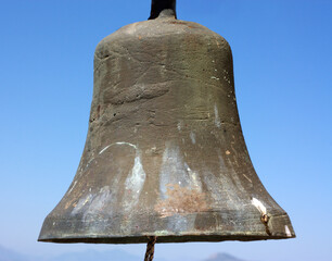 Bell against the sky
