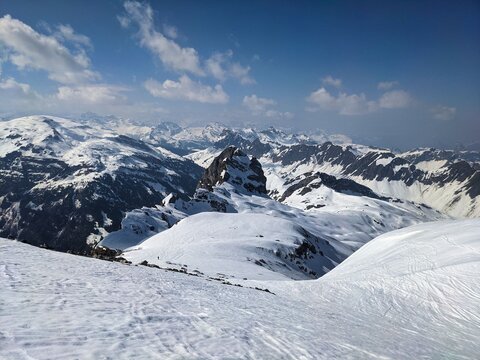 ski tour in the european mountains with fantastic views. Outdoor sport in winter. Winter landscape picture rock and snow