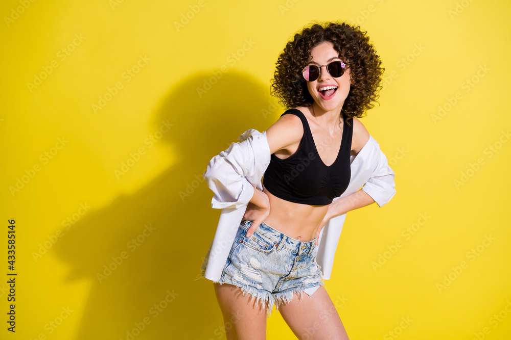 Sticker photo of young attractive lovely pretty smiling positive girl with curls look copyspace isolated on 