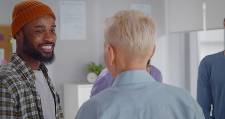 Diverse people attending support group meeting for mental health or dependency issues