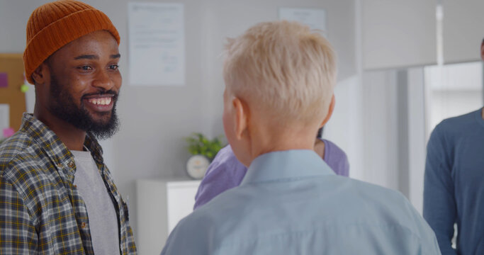 Diverse people attending support group meeting for mental health or dependency issues