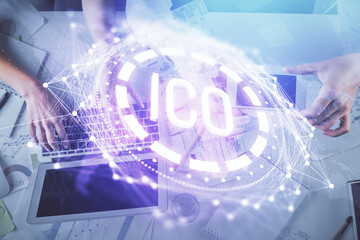 Double exposure of man and woman working together and crypto theme hologram drawing. Computer...