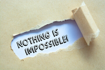 Text sign showing Nothing is Impossible!