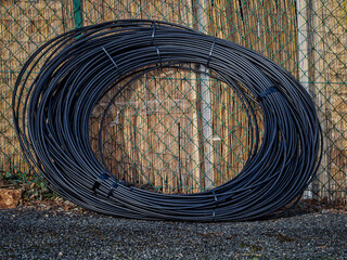 Coiled black cable