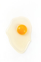 Raw egg ylolk isolated on white background