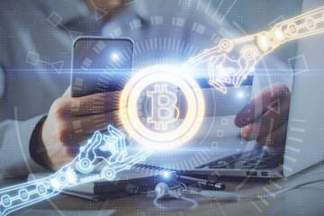 Double exposure of man hands holding a credit card and crypto business theme drawing. Digital blockchain and E-commerce concept.