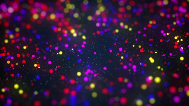 Many colorful balls. Neon glowing wave of particles. Abstract motion background. Seamless loop