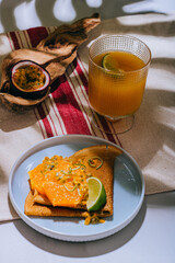Crepes Or Thin Pancakes With Delicious passion fruit and lime.