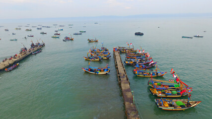 Fototapeta na wymiar Fishermen Boats composition in Aerial view that location in Port of Kota Agung, Tanggamus, Lampung, Indonesia