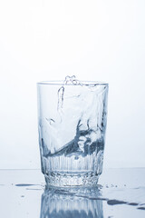 Alcoholic drink or water in a glass, splash, splash.