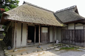 Fotobehang 日本の古い茅葺きの家 © masamasa3