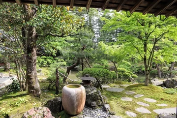 Fotobehang 日本の古い家の美しい庭の風景 © masamasa3
