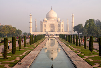 Taj Mahal ivory-white marble mausoleum on the south bank of Yamuna river in Agra, India