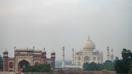 Taj Mahal ivory-white marble mausoleum on the south bank of Yamuna river in Agra, India