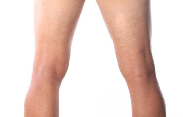 tan man leg isolated on white background