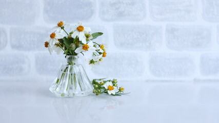 beautiful flower vase White brick wall background