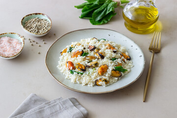 Risotto with mussels and spinach. Healthy food. Vegetarian food.