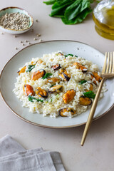 Risotto with mussels and spinach. Healthy food. Vegetarian food.
