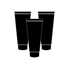 Three tubes of cosmetic creams for face and hands on a white background.