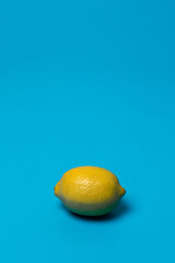 a lemon on a blue background