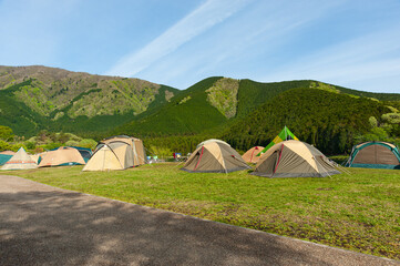 Camping Tents in Fuji-Hakone-Izu National Park. Lake Tanuki Campground in Fujinomiya City, Shizuoka Prefecture, Japan.