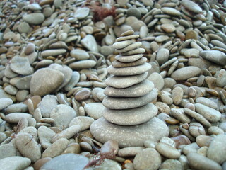 Fototapeta na wymiar Sea pebble pyramid