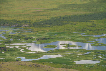 Beautiful green mountain scenery with lake system on tableland. Scenic alpine landscape with lakes...