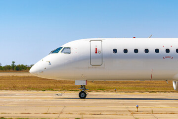 Close up of passenger airplane parked in airport