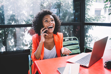 African American woman talking on smartphone
