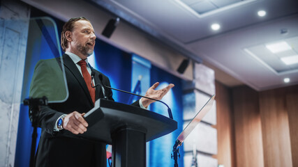 Charismatic Organization Representative Speaking at a Press Conference in USA Government Building....