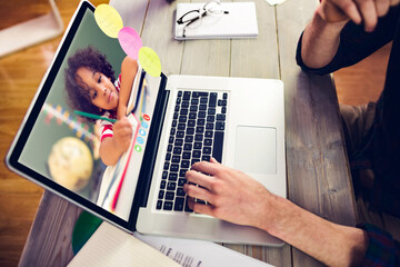 Caucasian businessman sitting at desk using laptop having video call