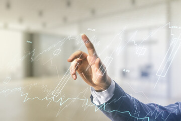 Fototapeta na wymiar Multi exposure of businessman hand presses on virtual creative financial chart hologram on blurred office background, research and analytics concept