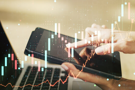 Multi exposure of abstract creative financial graph with finger presses on a digital tablet on background, forex and investment concept