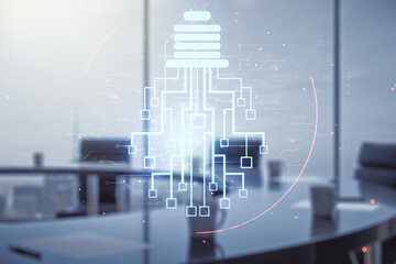 Fototapeta premium Double exposure of virtual creative light bulb hologram with chip on a modern meeting room background, idea and brainstorming concept