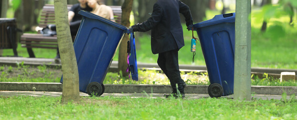 cleaning worker in the park