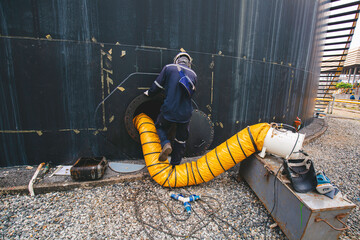 Male into the black fuel tank oil area confined space