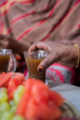 Two Black Muslim women having coffee together