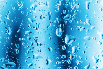 Rain window background. Water drops background. Wet glass surface texture. Bubble dew pattern. Transparent window blue raindrops. Bright white environment condensation texture.