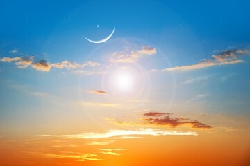 Crescent moon with beautiful sunset background .