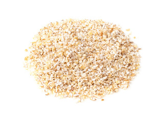 handful of crushed pot barley groats on white