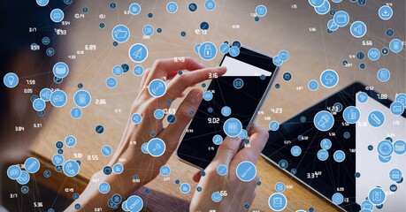 Composition of network of digital icons over woman using smartphone in background