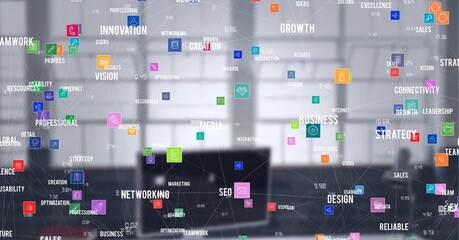 Composition of network of digital icons and text over computer in background