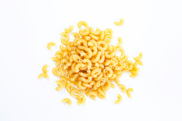 Various uncooked pasta on white background. Top view. Raw pasta with ingredients for cooking. Food concept