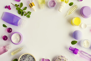Composition with organic natural cosmetic products on white background. Top view, flat lay. Beauty, skin, hair or body care concept. Self-care beauty and relaxation routine. Lavender and yellow colors