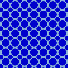 Blue polka dot background with bright royal blue in large and medium sized circles on a light  blue backdrop for design elements.